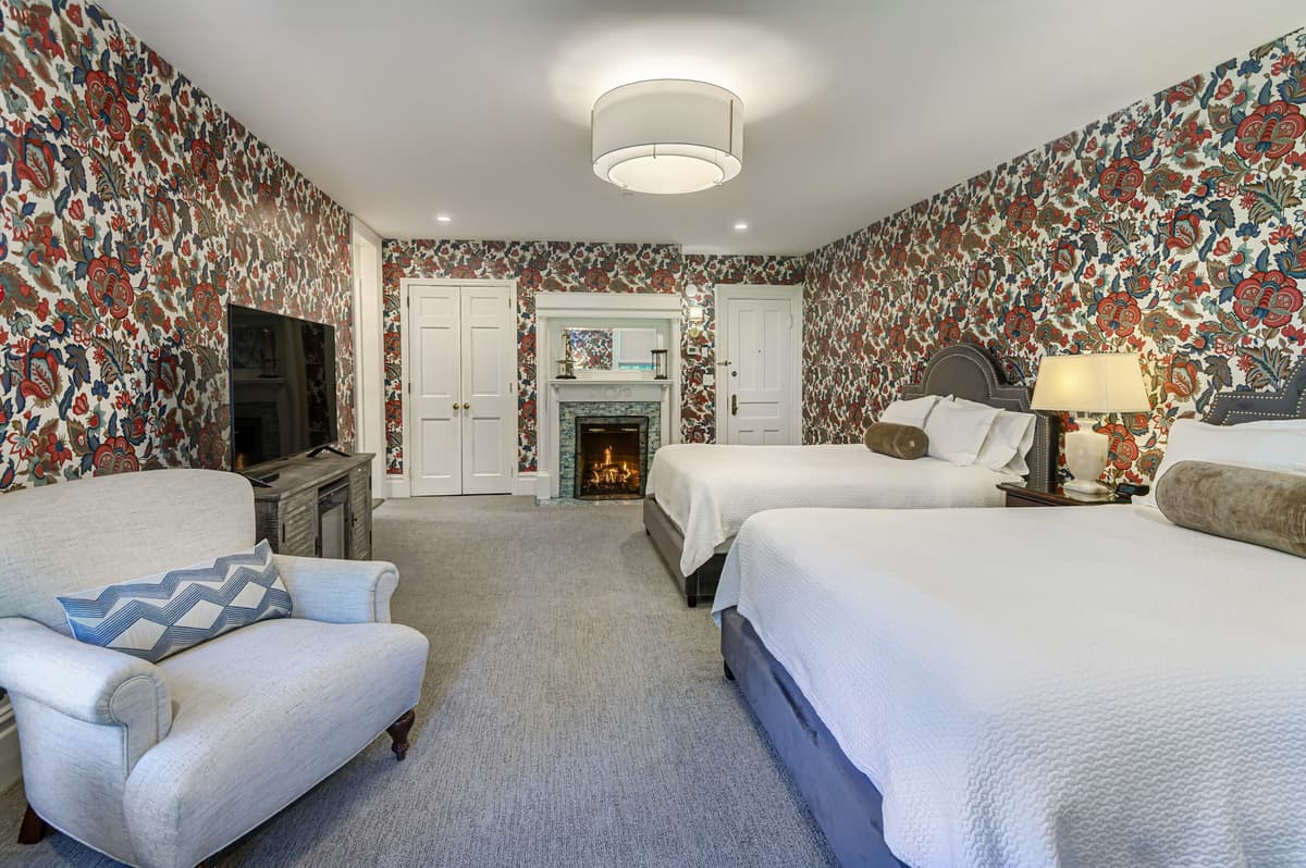 Room 102 — Deluxe Double Queen with fireplace